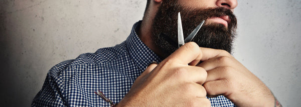 Trimming that beard with scissors